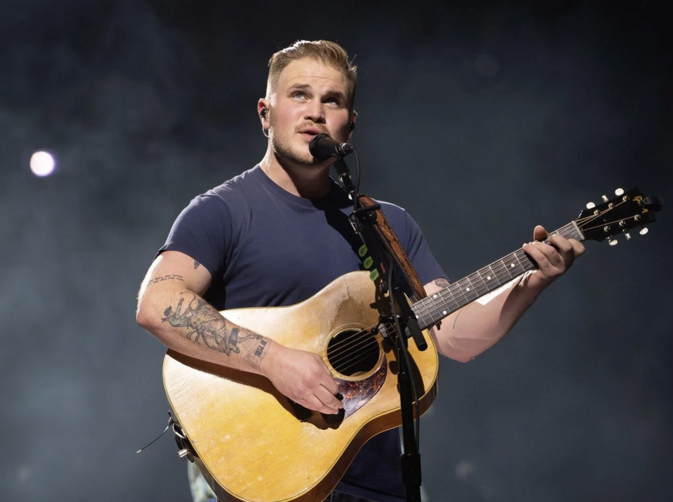 WATCH Zach Bryan Performs New Unreleased Song "Hey Driver" At Red Rocks