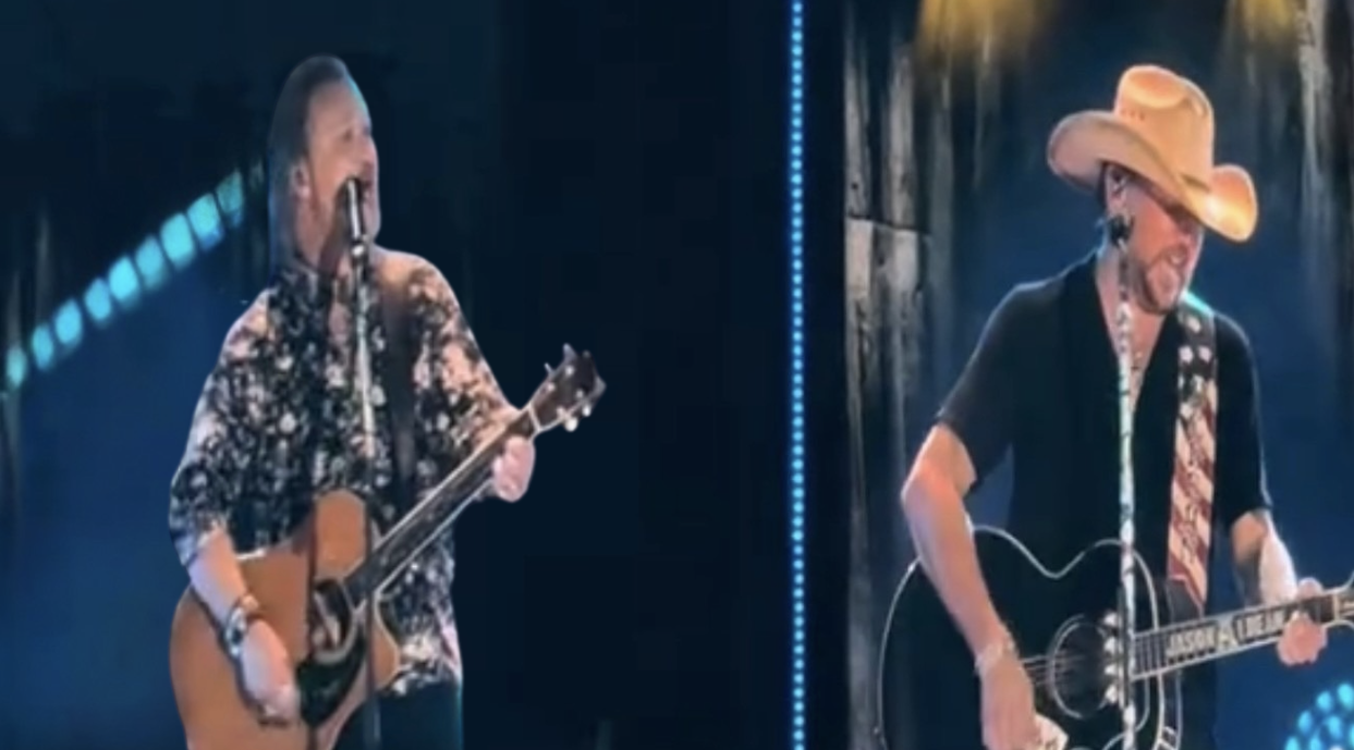 WATCH: Jason Aldean Brings Out Travis Tritt For Surprise Performance Of "It's A Great Day To Be Alive" During CMA Fest